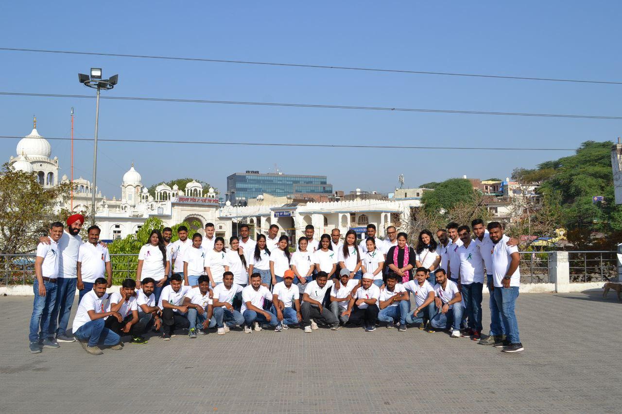 Joy of Giving team working with community members